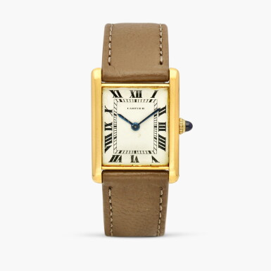 View full screen - View 1 of Lot 2499. Tank L.C. Extra Thin | A slim rectangular yellow gold wristwatch with gold deployant buckle, Circa 1967.