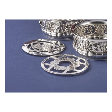 View full screen - View 1 of Lot 32. A PAIR OF DANISH SILVER GRAPEVINE PATTERN WINE COASTERS WITH PIERCED LINERS, NO. 289B, GEORG JENSEN SILVERSMITHY, COPENHAGEN, CIRCA 1919-27 AND 1930'S.