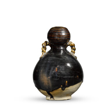 View full screen - View 1 of Lot 338. A brown-glazed double-gourd vase, 10th century | 十世紀 褐釉繩耳葫蘆瓶.
