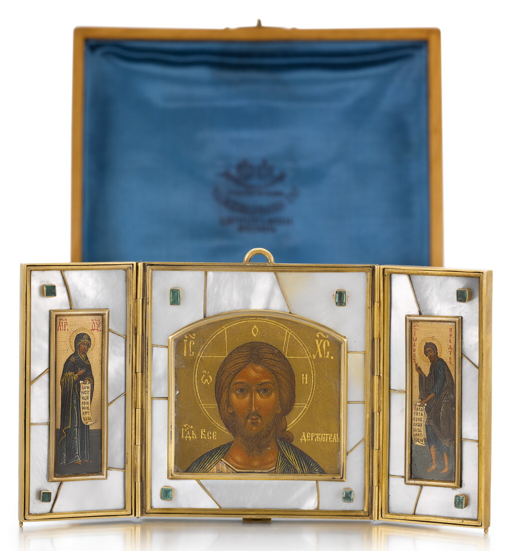 View full screen - View 1 of Lot 508. A GEM-SET SILVER-GILT AND MOTHER OF PEARL TRAVELLING TRIPTYCH ICON, OLOVYANISHNIKOV AND SONS, MOSCOW, 1908-1917.