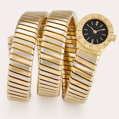 View full screen - View 1 of Lot 448. Tubogas | A yellow and white gold expandable bracelet watch, Circa 2000.