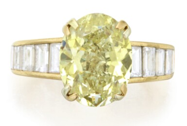 View full screen - View 1 of Lot 399. FANCY YELLOW DIAMOND AND DIAMOND RING.