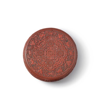 View full screen - View 1 of Lot 231. A carved cinnabar lacquer 'longevity' box and cover, Qing dynasty, Qianlong period | 清乾隆 剔紅「萬歲長春」蓋盒.
