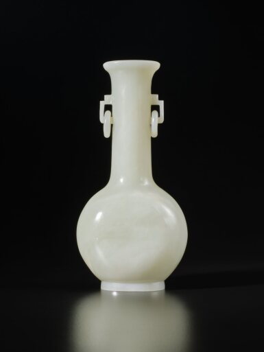 View full screen - View 1 of Lot 299. A white jade vase, 19th / 20th century | 十九 / 二十世紀 白玉雕雙耳活環長頸瓶.