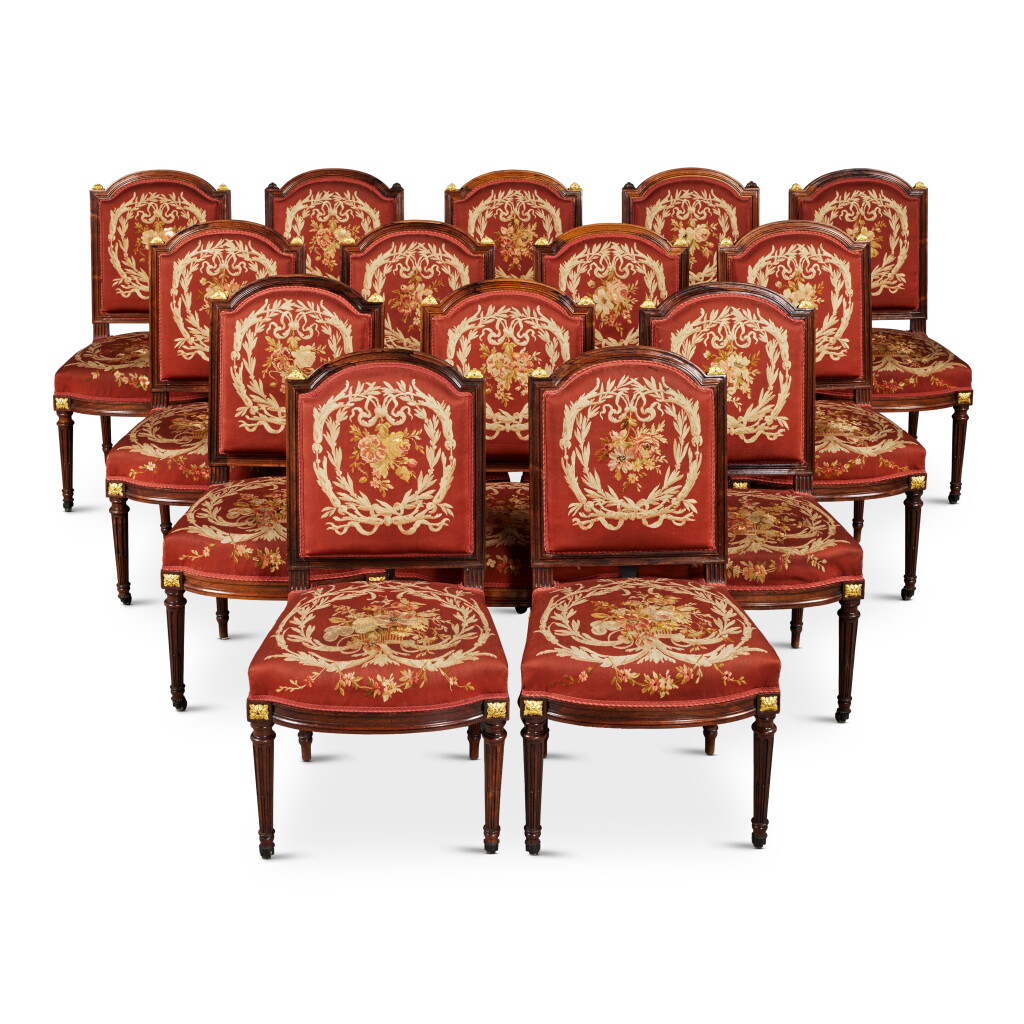 View full screen - View 1 of Lot 718. A Set of Fourteen Louis-Philippe Parcel Gilt Rosewood Side Chairs in the Louis XVI Revival Style, Circa 1850.