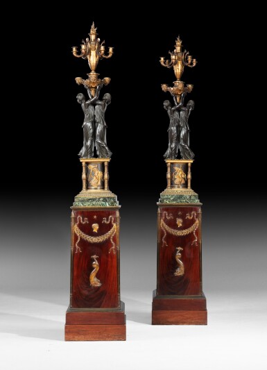 View full screen - View 1 of Lot 20. A pair of Empire patinated and gilt-bronze six-light candelabra, circa 1810-1815, attributed to Pierre-Philippe Thomire | Paire de candélabres aux femmes antiques en bronze patiné et doré et leurs piédestaux en placage d’acajou, bronze doré et marbre vert de mer d’époque Empire vers 1810-1815 attribués à Pierre-Philippe Thomire.