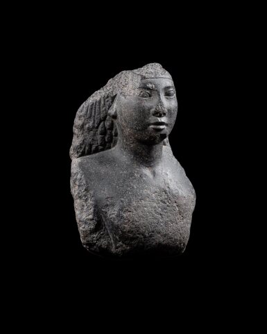 View full screen - View 1 of Lot 136. An Egyptian Granite Bust of a Man, 26th Dynasty, 664-525 B.C..