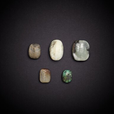 View full screen - View 1 of Lot 6823. Five jade and turquoise 'turtle's shell' pendants, Western Zhou dynasty and later | 西周及更晚 青玉龜甲墜四件及松石龜甲墜一件.