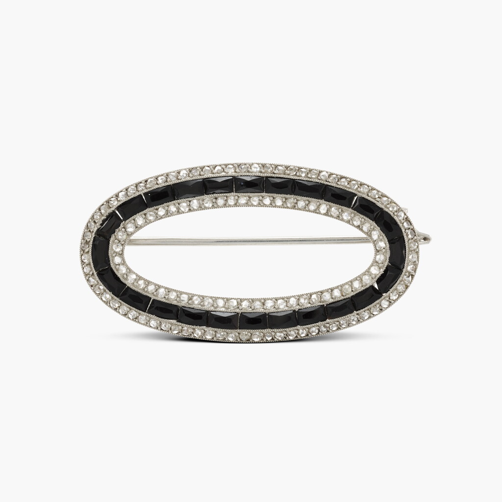 View full screen - View 1 of Lot 224. Onyx and Diamond Brooch.