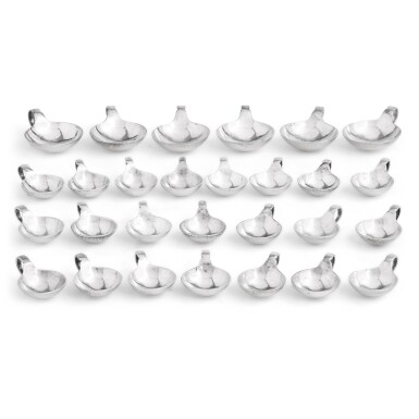 View full screen - View 1 of Lot 13. Twenty-eight Danish silver salt cellars, Georg Jensen, ranging from 1910-25 period mark to post-1945 marks.