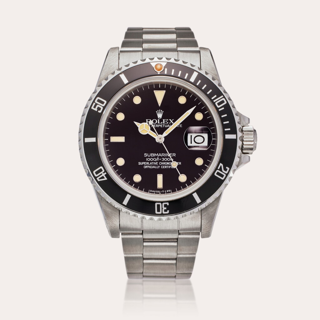 View full screen - View 1 of Lot 82. Reference 16800 Submariner | A stainless steel automatic wristwatch with date and bracelet, Circa 1984.