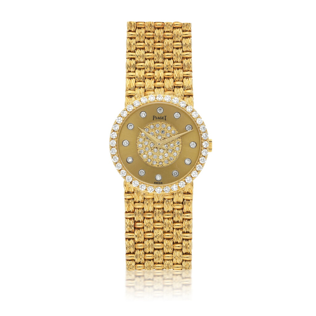 View full screen - View 1 of Lot 140. PIAGET | REF 9706 D23, A YELLOW GOLD AND DIAMOND-SET BRACELET WATCH CIRCA 1970.