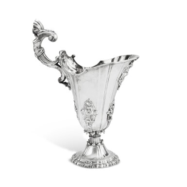 View full screen - View 1 of Lot 175. A silver ewer, apparently unmarked, probably Portugal 18th century | Aiguière en argent, apparemment non poinçonnée, probablement Portugal XVIIIe siècle.