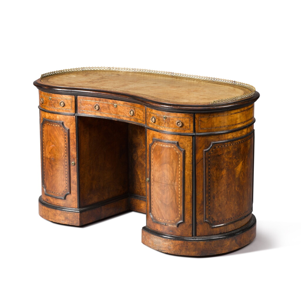 View full screen - View 1 of Lot 198. An early-Victorian burr walnut and chequer-banded kidney-form desk, mid-19th century.