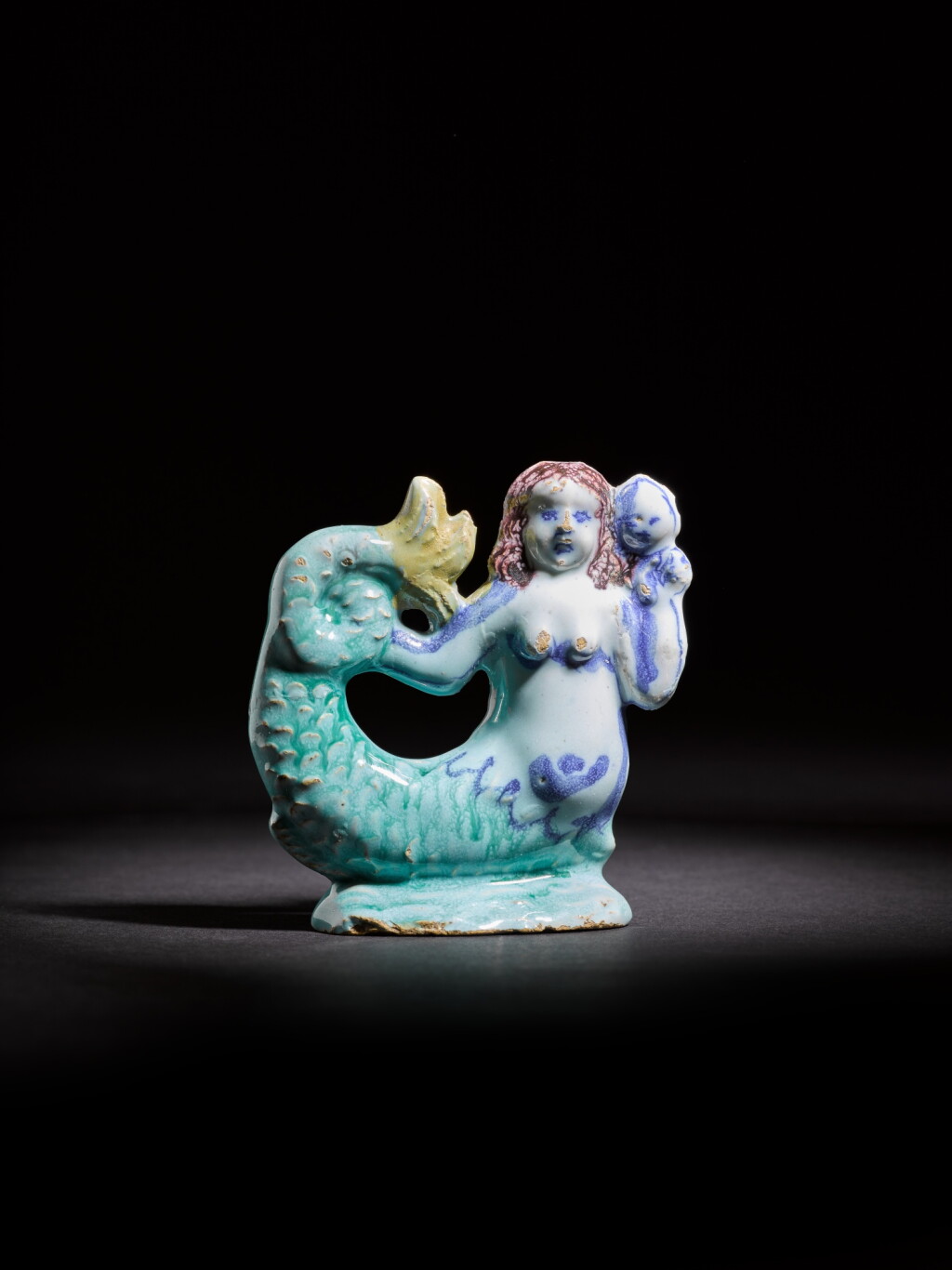 View full screen - View 1 of Lot 10. An English delftware figure of a mermaid, circa 1675, London, Southwark.