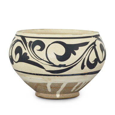 View full screen - View 1 of Lot 400. "A BLACK-PAINTED CIZHOU PAINTED JAR SONG DYNASTY" | 宋 磁州白地黑彩卷草紋罐.