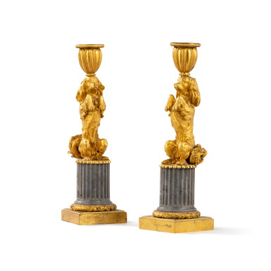 View full screen - View 1 of Lot 1027. A pair of Louis XVI gilt-bronze and marble "aux chiens savants" candlesticks, late 18th-early 19th century | Paire de flambeaux "aux chiens savants" en marbre et bronze doré, fin XVIIIe-début XIXe siècle.