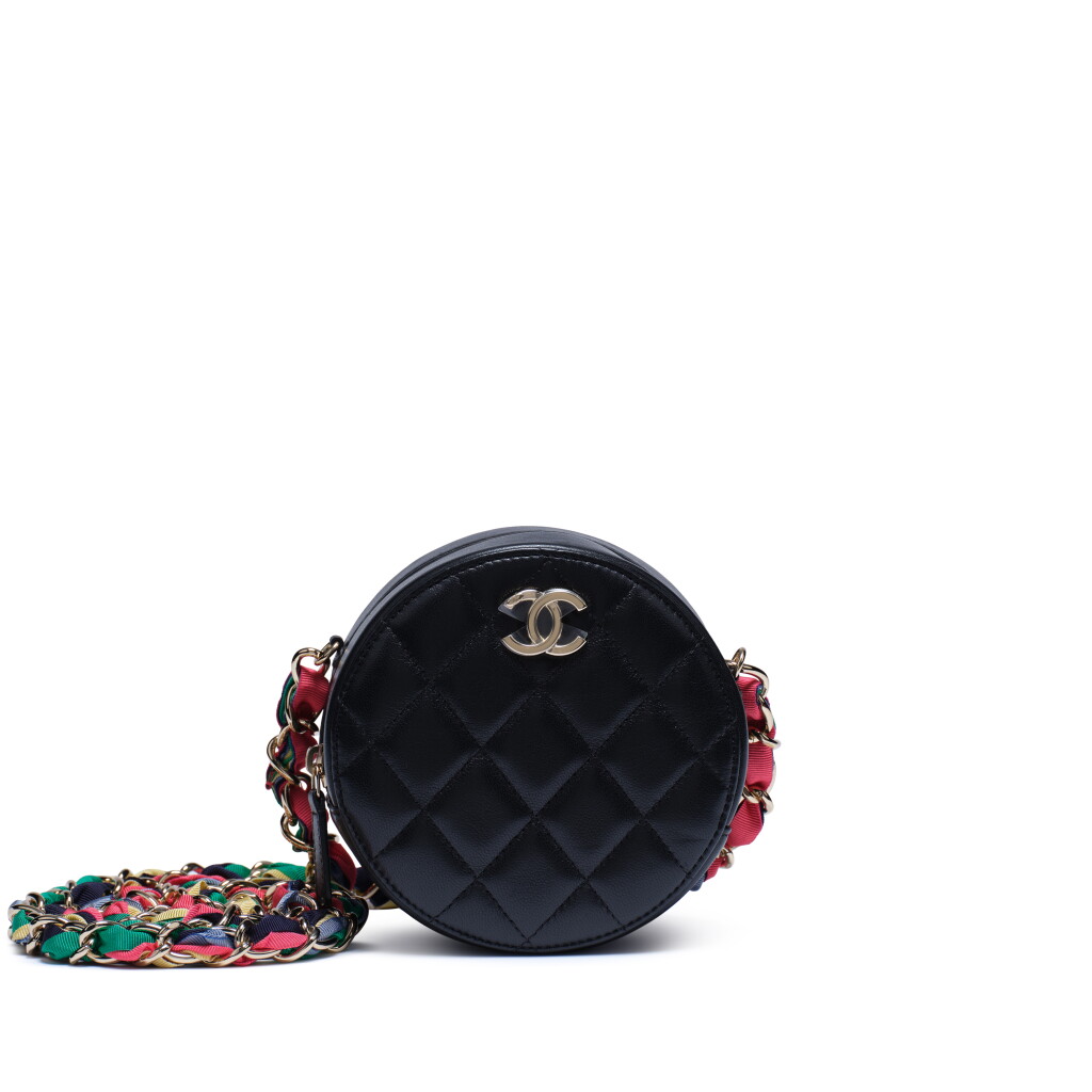 View full screen - View 1 of Lot 153. Black Quilted Lambskin Leather and Ribbon CC Round Clutch with Chain light Gold Hardware, 2020-2021.