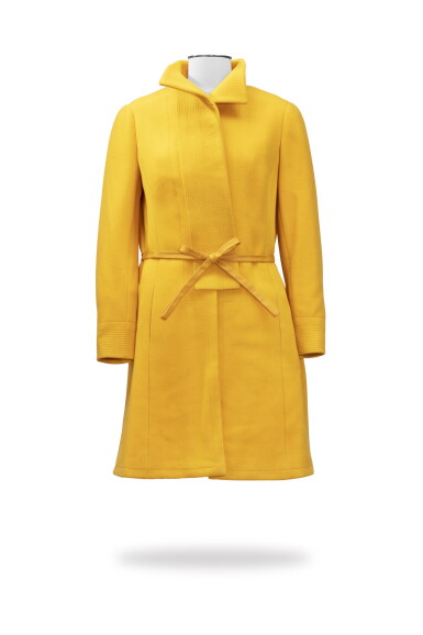 View full screen - View 1 of Lot 17. Roberto Capucci, Haute Couture, circa 1962-1968, Gabardine coat with leather belt | Manteau à petit col montant.