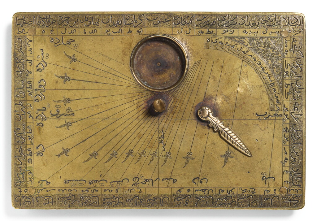 View full screen - View 1 of Lot 128. A SAFAVID BRASS HORIZONTAL DIAL AND QIBLA INDICATOR, SIGNED BY MUHAMMAD MAHDI AL-YAZDI, PERSIA, SECOND HALF 17TH CENTURY.