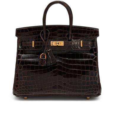 View full screen - View 1 of Lot 109. Havane Shiny Niloticus Crocodile Birkin 25 Gold Hardware, 2011.