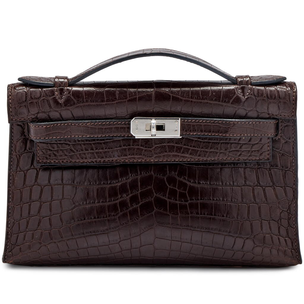 View full screen - View 1 of Lot 1218. Marron Fonce Matte Niloticus Crocodile Kelly Pochette with Diamonds and White Gold, 2006.