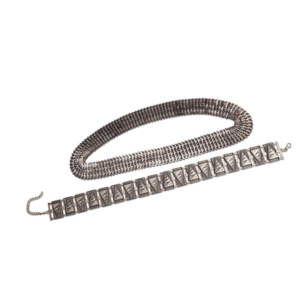 View full screen - View 1 of Lot 75. Set of Two: A Unmarked Silver Metal Belt and A Shoulder Accessory .