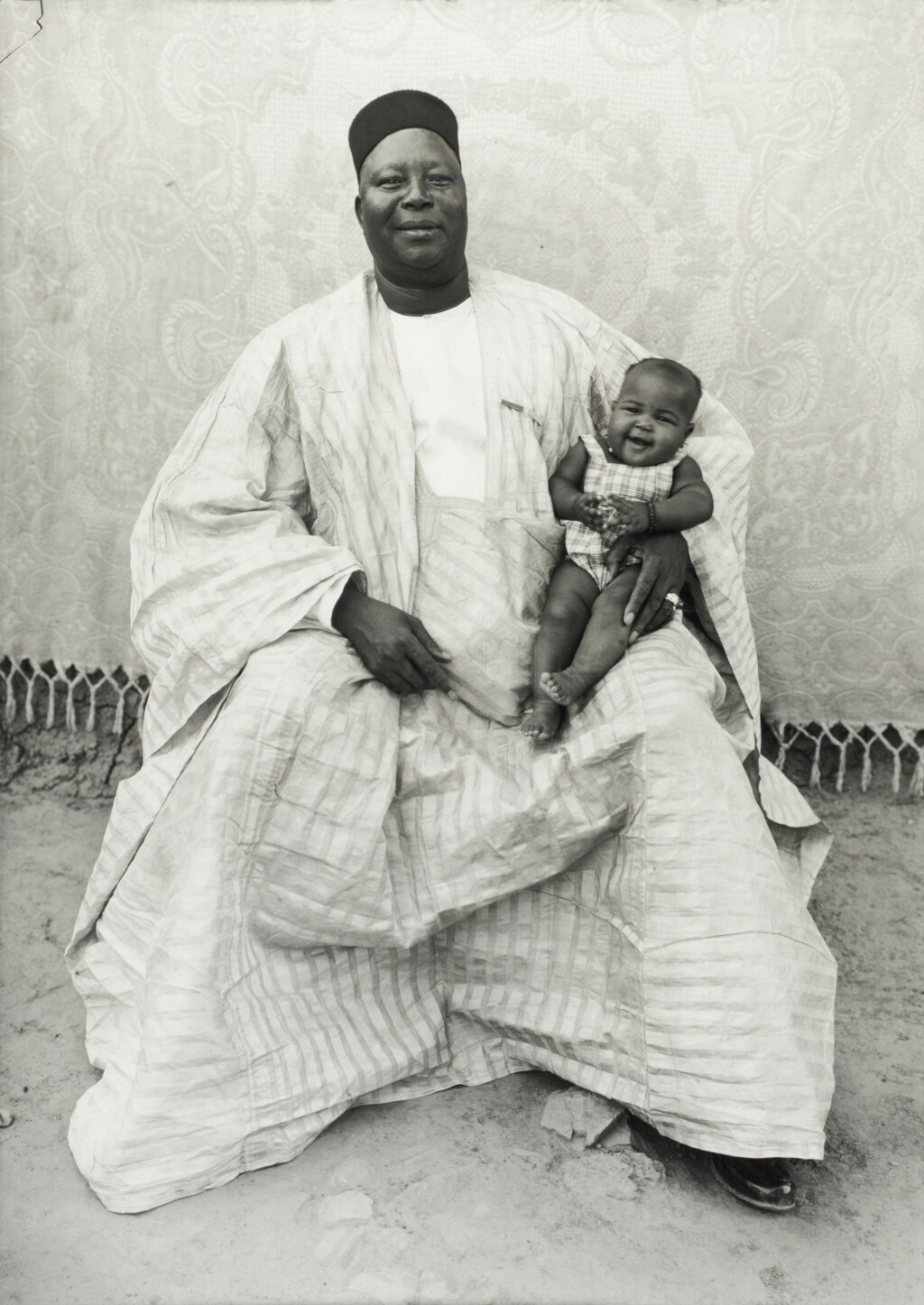 View full screen - View 1 of Lot 129. SEYDOU KEÏTA | 'UNTITLED (FATHER WITH DAUGHTER)', BAMAKO, MALI, 1949-1951.