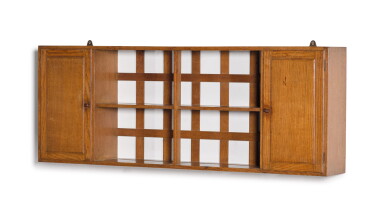 View full screen - View 1 of Lot 152. A COTSWOLD SCHOOL HANGING SHELF, CIRCA 1920, THE DESIGN ATTRIBUTED TO EARNEST GIMSON .