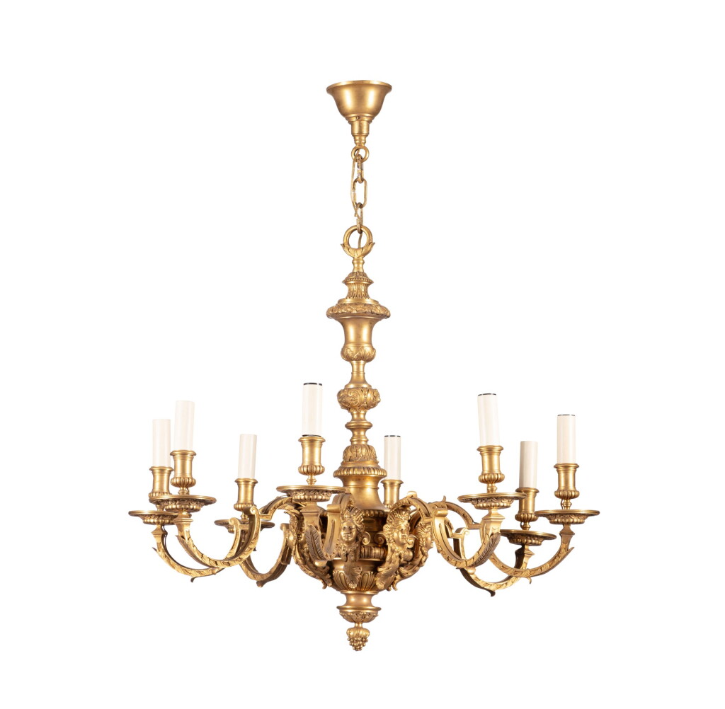 View full screen - View 1 of Lot 19. A pair of Louis XIV style gilt-bronze eight-light chandeliers, early 20th century | Paire de lustres en bronze doré de style Louis XVI, début du XXe siècle.