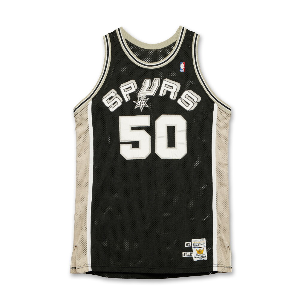 View full screen - View 1 of Lot 140. David Robinson ‘Rookie Season’ & 'Sophomore Season' San Antonio Spurs 1989-1990, and 1990-1991 Game Worn Jersey | NBA Rookie of the Year | Matched to Multiple Games | All-NBA 3rd Team.