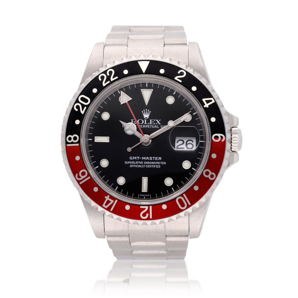 View full screen - View 1 of Lot 246. Reference 16700 GMT-Master 'Coke' | A stainless steel dual time wristwatch with date and bracelet, Circa 1998.