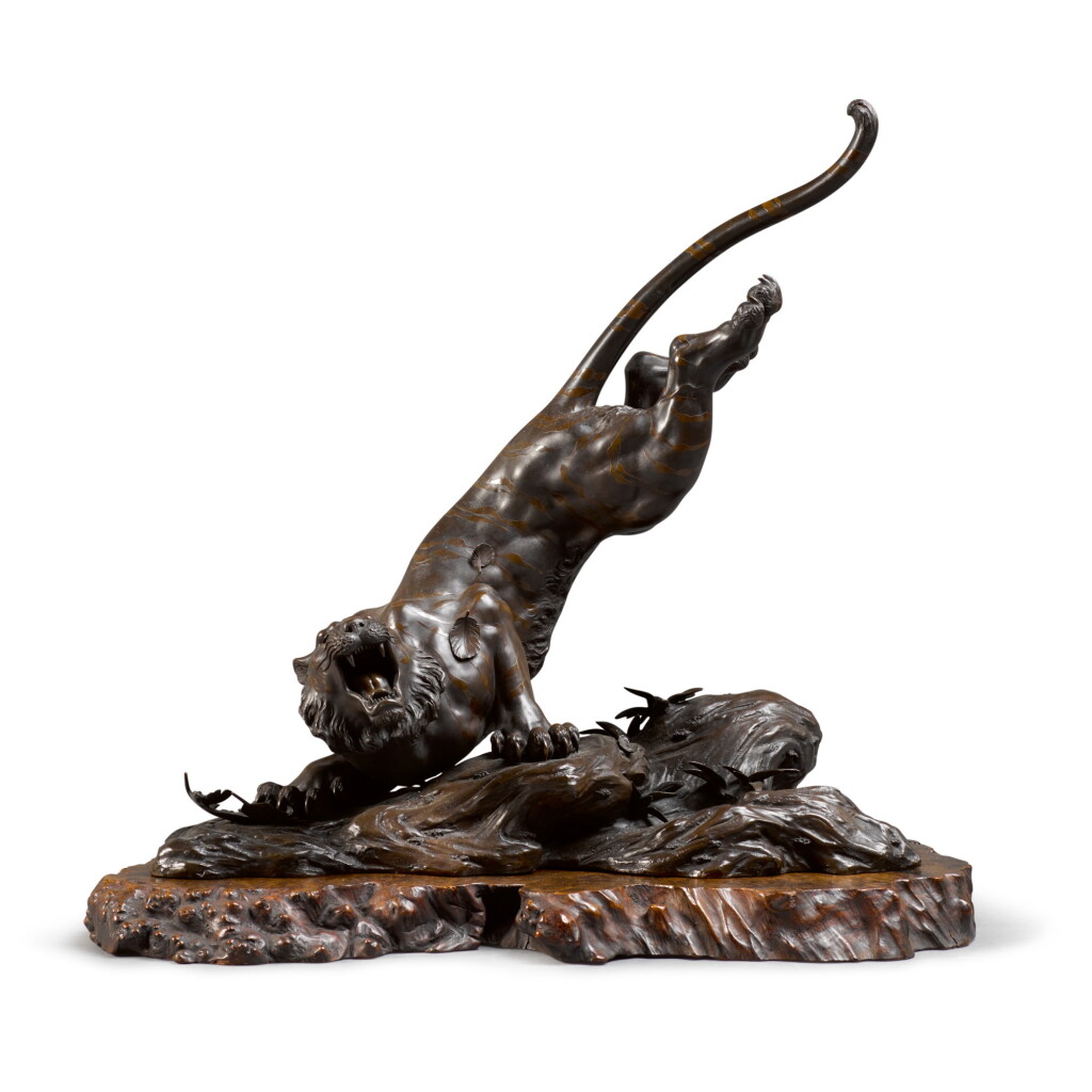 View full screen - View 1 of Lot 108. AN IMPRESSIVE BRONZE MODEL OF A TIGER SIGNED ATSUYOSHI SAKU and MARUKI SHACHU SEISAKU, MEIJI PERIOD, LATE 19TH CENTURY.