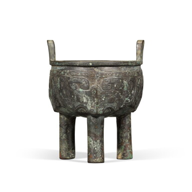 View full screen - View 1 of Lot 246. An archaic bronze tripod food vessel (Ding), Late Shang dynasty | 商末 青銅饕餮紋鼎.