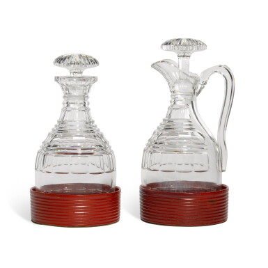 View full screen - View 1 of Lot 267. A cut claret jug and stopper and decanter and stopper with red lacquer coaster, circa 1825.