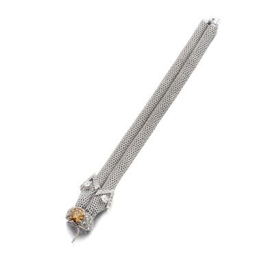 View full screen - View 1 of Lot 1151. Fancy deep brownish yellowish orange diamond and diamond bracelet.