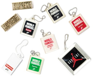 View full screen - View 1 of Lot 56. A GROUP OF 14 SUPREME SHOE HANG TAGS.