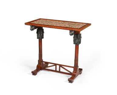 View full screen - View 1 of Lot 137. A mahogany, patinated bronze, ebony, hippopotamus ivory and Egyptian pink granit centre table, early 19th century.