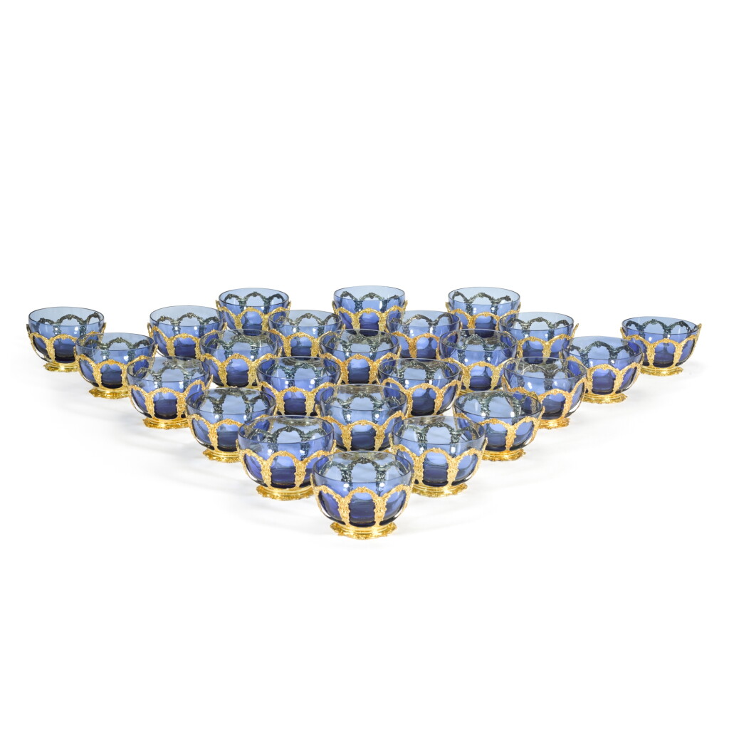 View full screen - View 1 of Lot 43. A set of twenty-four American silver-gilt and glass finger bowls, Tiffany & Co., New York, circa 1896.