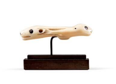 View full screen - View 1 of Lot 51. Amulette mi-ours mi-phoque en ivoire de morse, Inuit, Alaska | Inuit walrus ivory half bear half seal charm, Alaska.
