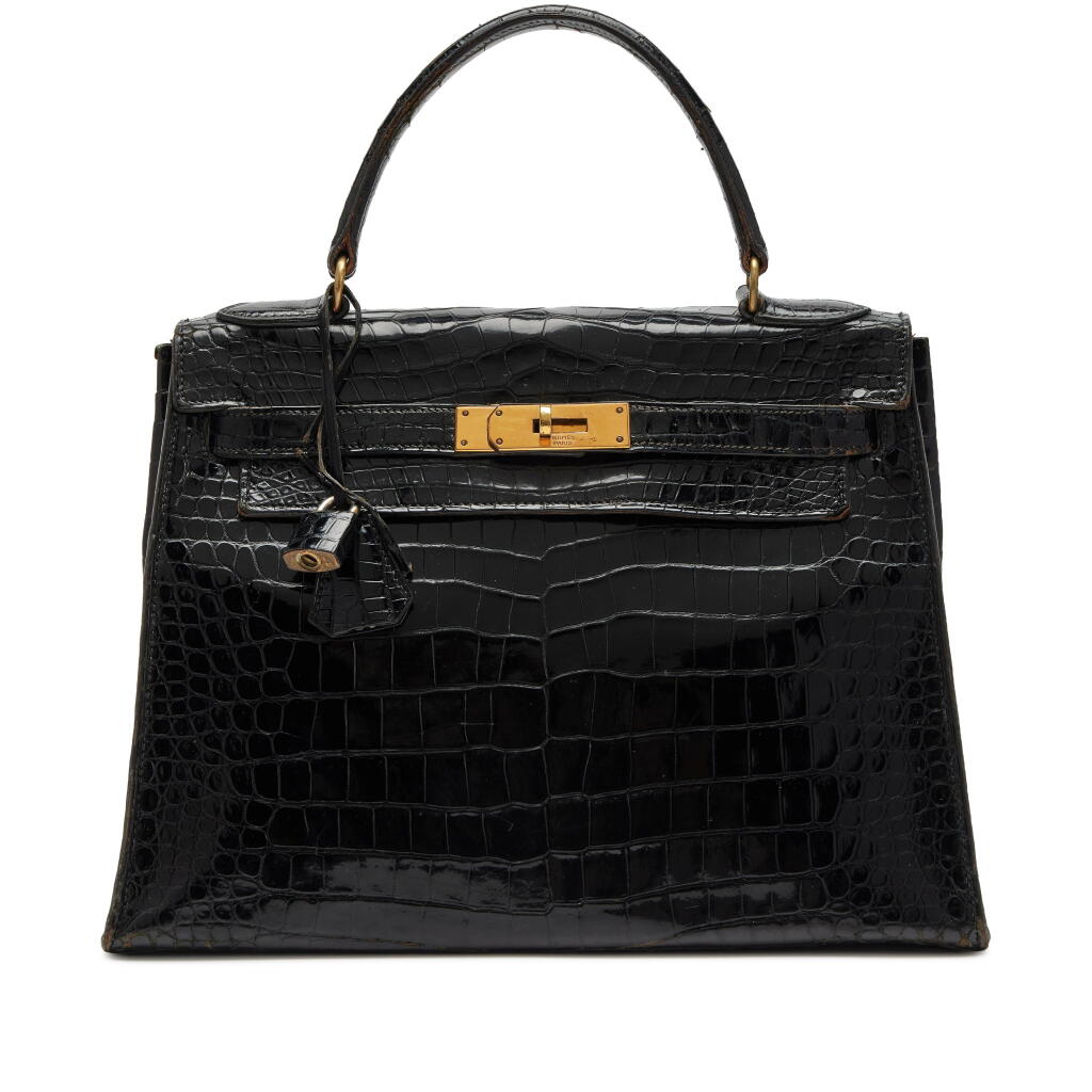 View full screen - View 1 of Lot 66. Vintage Black Shiny Porosus Crocodile Kelly 28 Sellier Gold Hardware, 1995.