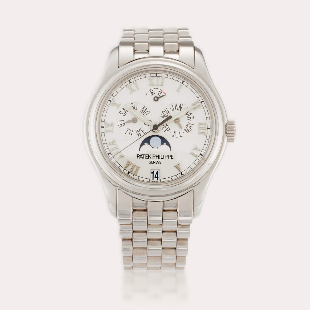 View full screen - View 1 of Lot 60. Reference 5036/1G-017 | A white gold automatic annual calendar wristwatch with moon phases, power reserve indication, and bracelet, Circa 2002.