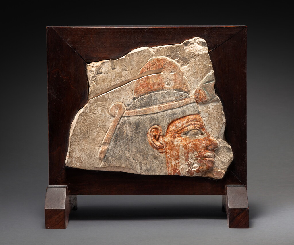 View full screen - View 1 of Lot 215. An Egyptian Polychrome Limestone Relief Fragment, 18th/19th Dynasty, 1540-1190 B.C..