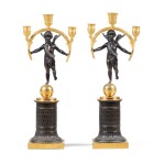A pair of patinated and gilt-bronze candelabra, French Restauration, circa 1830