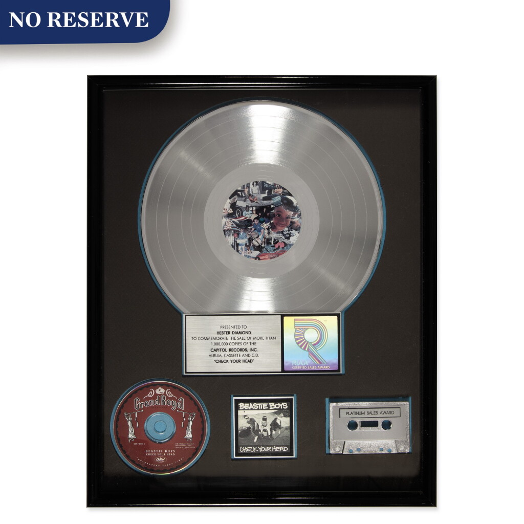 View full screen - View 1 of Lot 308. RIAA Gold Sales Award presented to Hester Diamond for the Beastie Boys 1992 album “Check Your Head” .