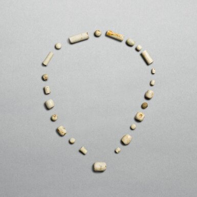 View full screen - View 1 of Lot 712. A group of calcified jade beads, Neolithic period, Liangzhu culture | 新石器時代 良渚文化 玉珠管一組.