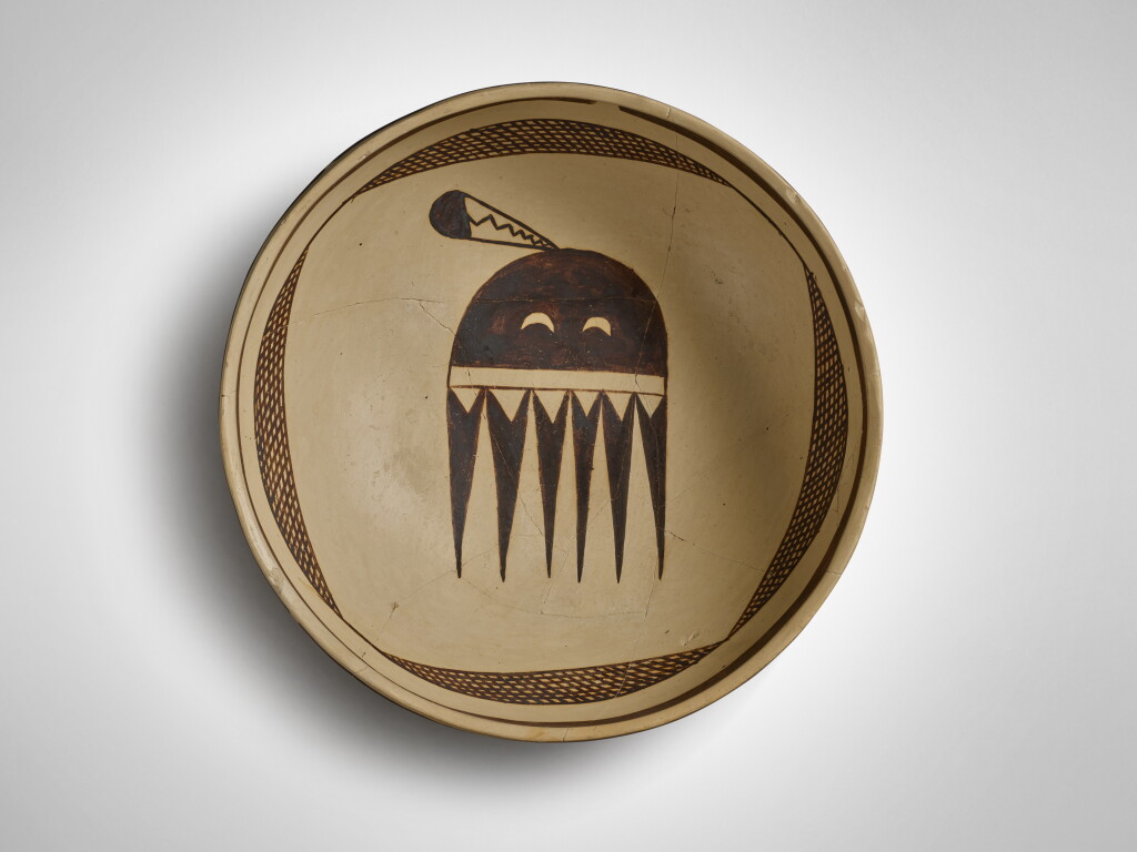 View full screen - View 1 of Lot 729. Jeddito Black-on-Yellow Bowl with Katsina Motif, circa 1300 - 1600 AD.