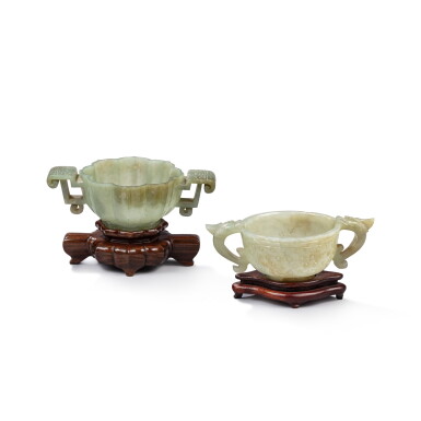 View full screen - View 1 of Lot 513. Two celadon jade archaistic handled cups, Ming / Qing dynasty.