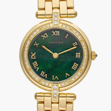 View full screen - View 1 of Lot 519. Reference 883965 Panthère Vendôme | A yellow gold and diamond-set bracelet watch with bloodstone dial, Circa 1990.