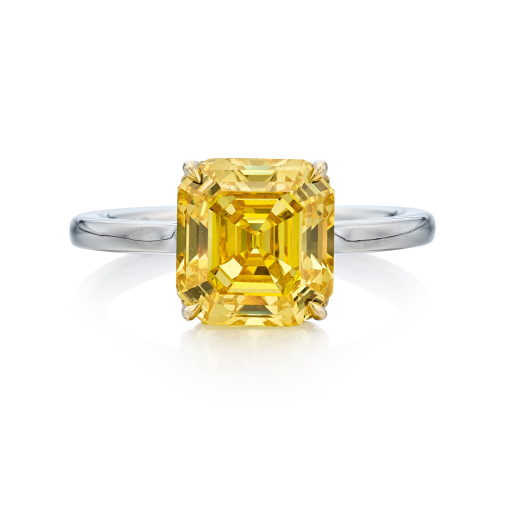 View full screen - View 1 of Lot 169. Fancy Vivid Orangy Yellow Diamond Ring.